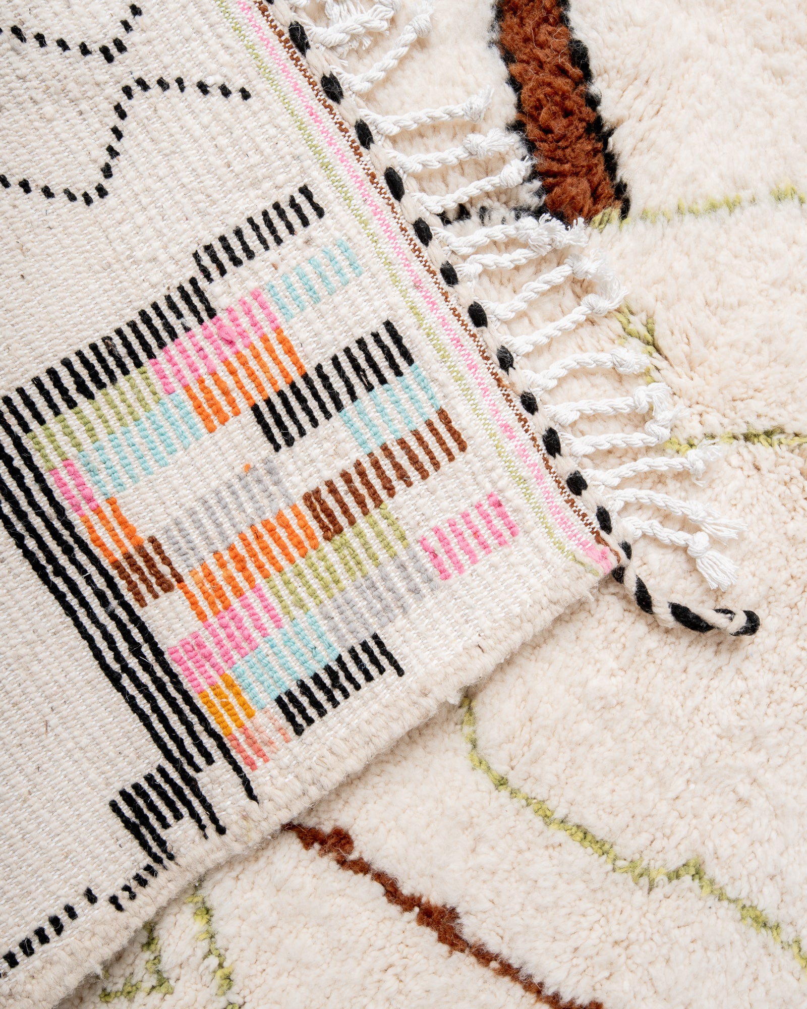 Modern, designer, handcrafted Berber rug from Morocco. Beniourain carpet with beautiful colours and patterns and fluffy wool texture.