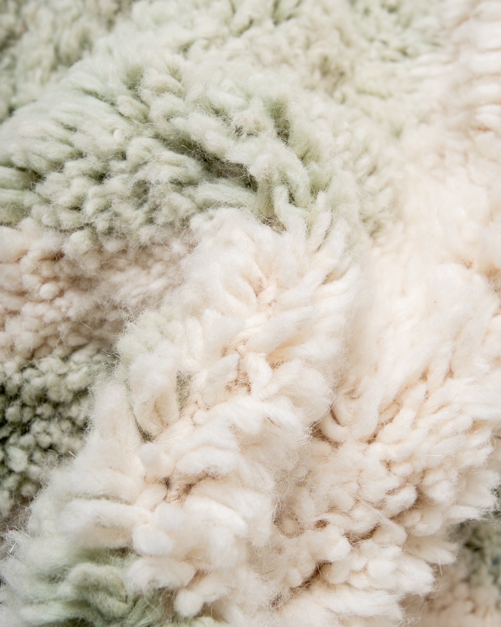 Modern, designer, handcrafted Berber rug from Morocco. Beniourain carpet with beautiful colours and patterns and fluffy wool texture.