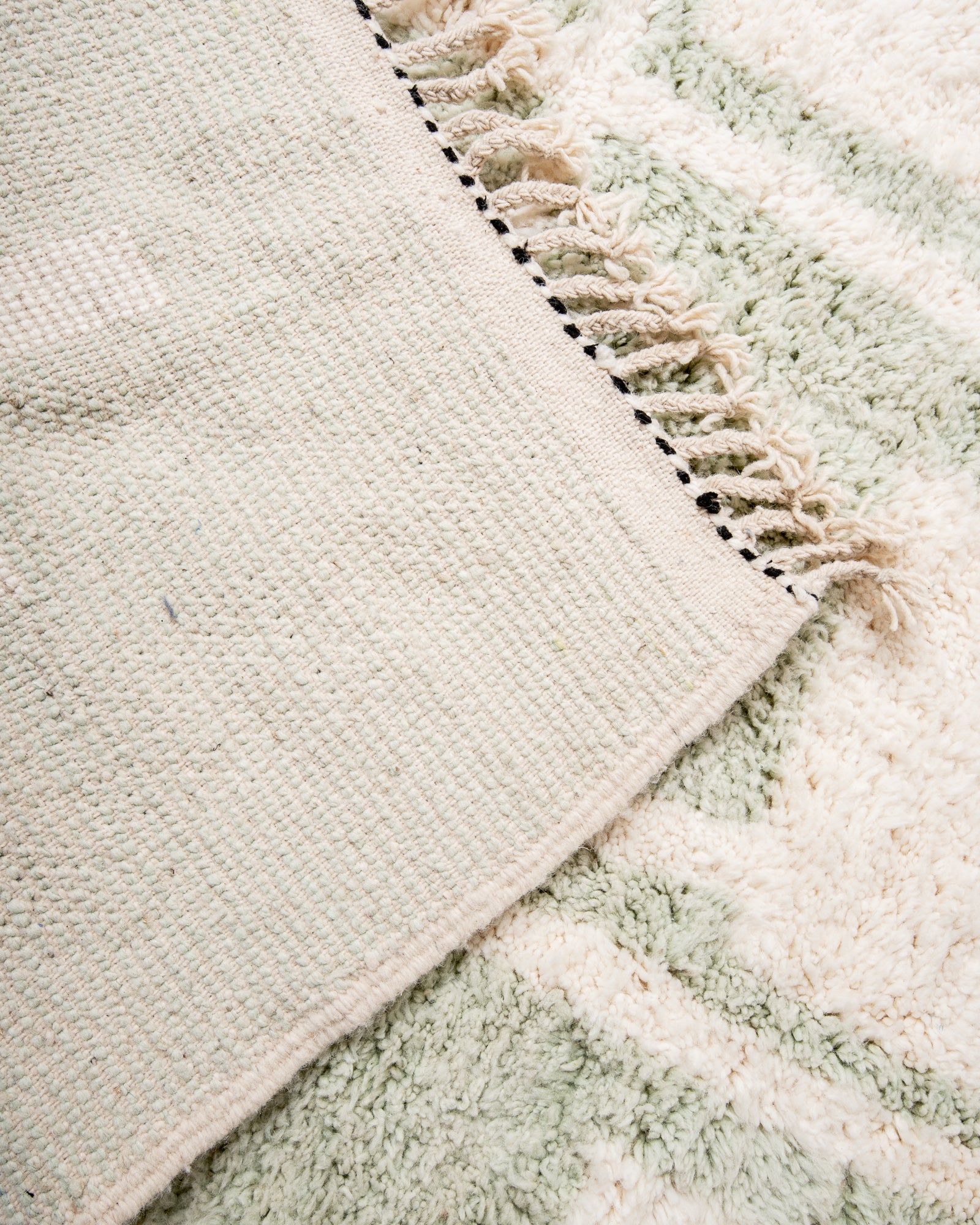 Modern, designer, handcrafted Berber rug from Morocco. Beniourain carpet with beautiful colours and patterns and fluffy wool texture.