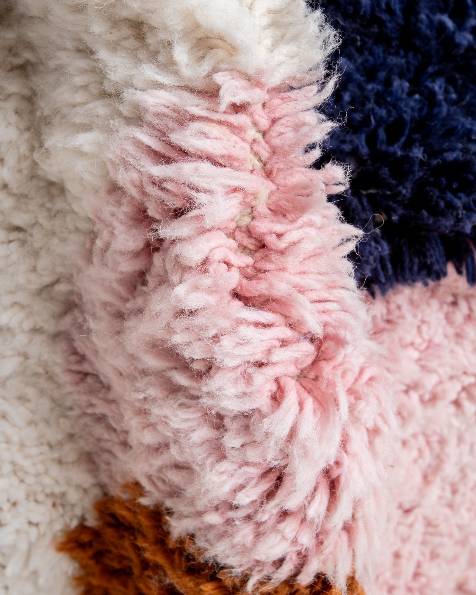 Modern, designer, handcrafted Berber rug from Morocco. Beniourain carpet with beautiful colours and patterns and fluffy wool texture.