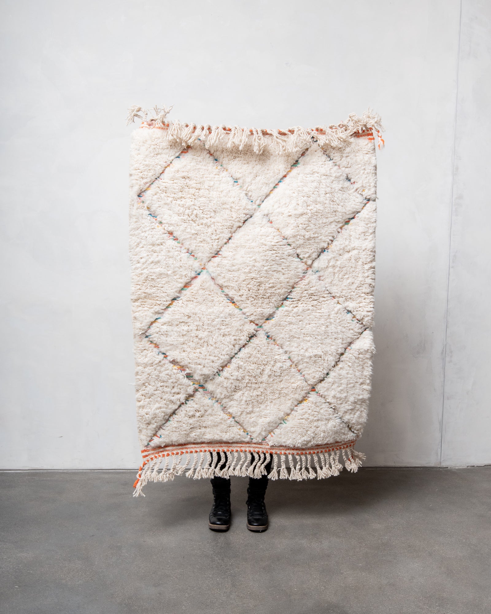 Modern, designer, handcrafted Berber rug from Morocco. Beniourain carpet with beautiful colours and patterns and fluffy wool texture.