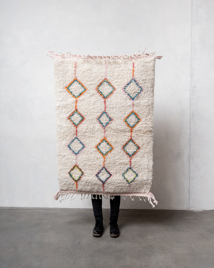 Modern, designer, handcrafted Berber rug from Morocco. Beniourain carpet with beautiful colours and patterns and fluffy wool texture.