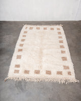 Modern, designer, handcrafted Berber rug from Morocco. Beniourain carpet with beautiful colours and patterns and fluffy wool texture.