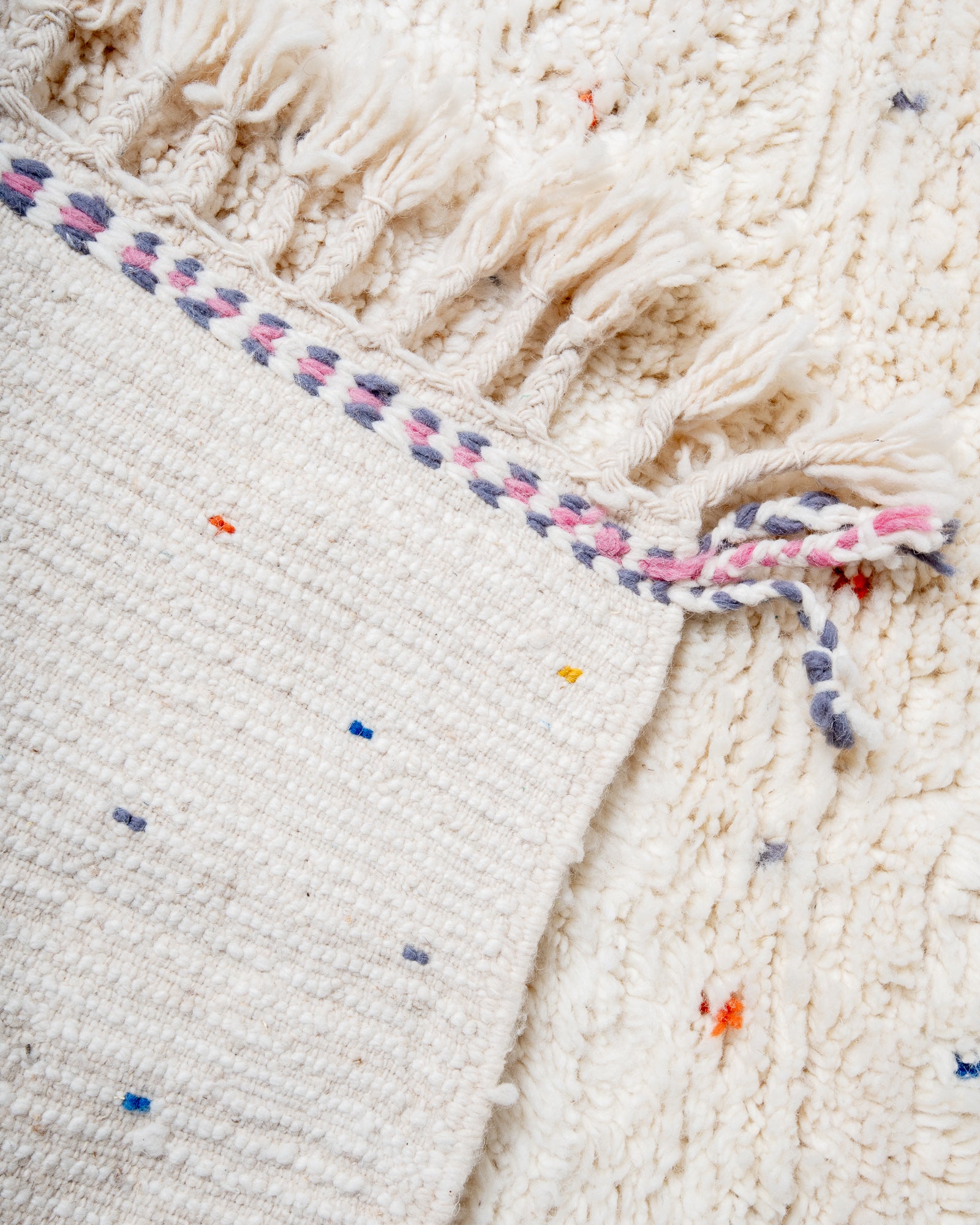 Modern, designer, handcrafted Berber rug from Morocco. Beniourain carpet with beautiful colours and patterns and fluffy wool texture.