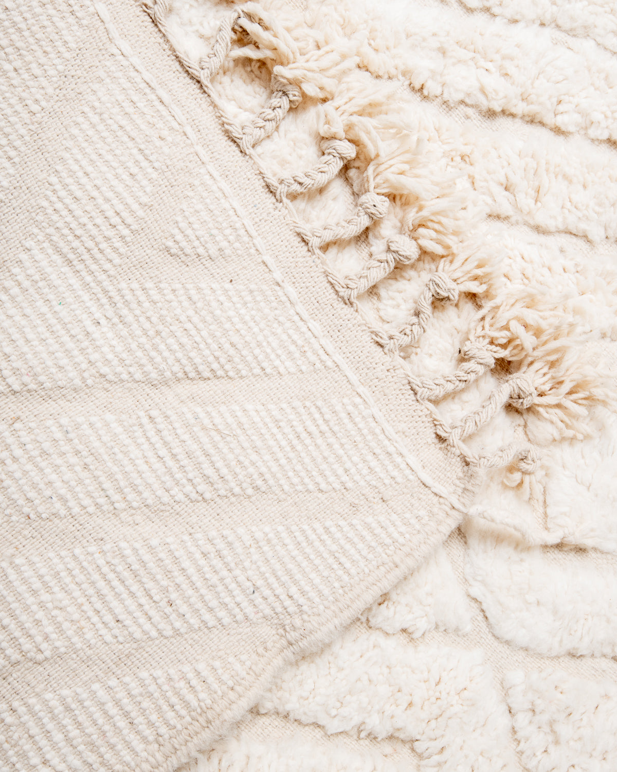 Modern, designer, handcrafted Berber rug from Morocco. Beniourain carpet with beautiful colours and patterns and fluffy wool texture.