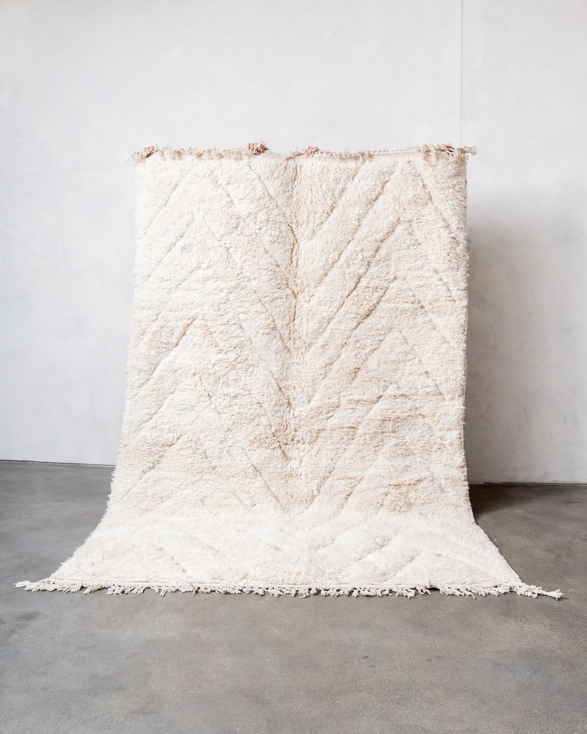 Modern, designer, handcrafted Berber rug from Morocco. Beniourain carpet with beautiful colours and patterns and fluffy wool texture.