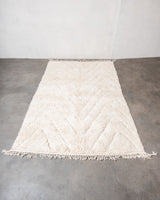 Modern, designer, handcrafted Berber rug from Morocco. Beniourain carpet with beautiful colours and patterns and fluffy wool texture.