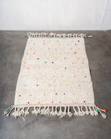 Modern, designer, handcrafted Berber rug from Morocco. Beniourain carpet with minimalist design, natural wool pile and a fluffy texture.