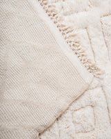 Modern, designer, handcrafted Berber rug from Morocco. Beniourain carpet with beautiful colours and patterns and fluffy wool texture. 
