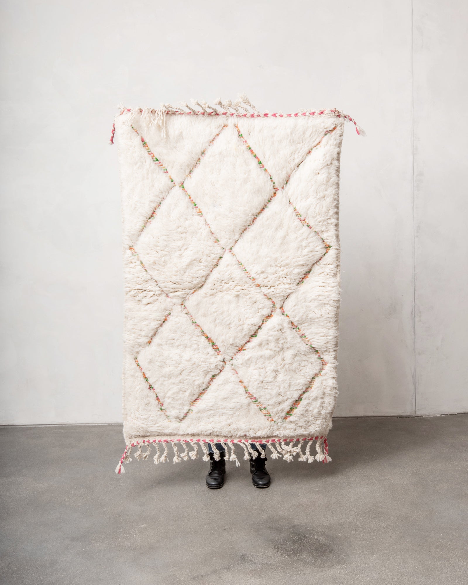 Modern, designer, handcrafted Berber rug from Morocco. Beniourain carpet with beautiful colours and patterns and fluffy wool texture.