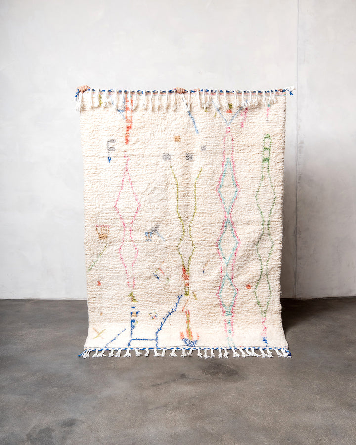 Modern, designer, handcrafted Berber rug from Morocco. Beniourain carpet with beautiful colours and patterns and fluffy wool texture.