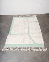 Modern, designer, handcrafted Berber rug from Morocco. Beniourain carpet with beautiful colours and patterns and fluffy wool texture.