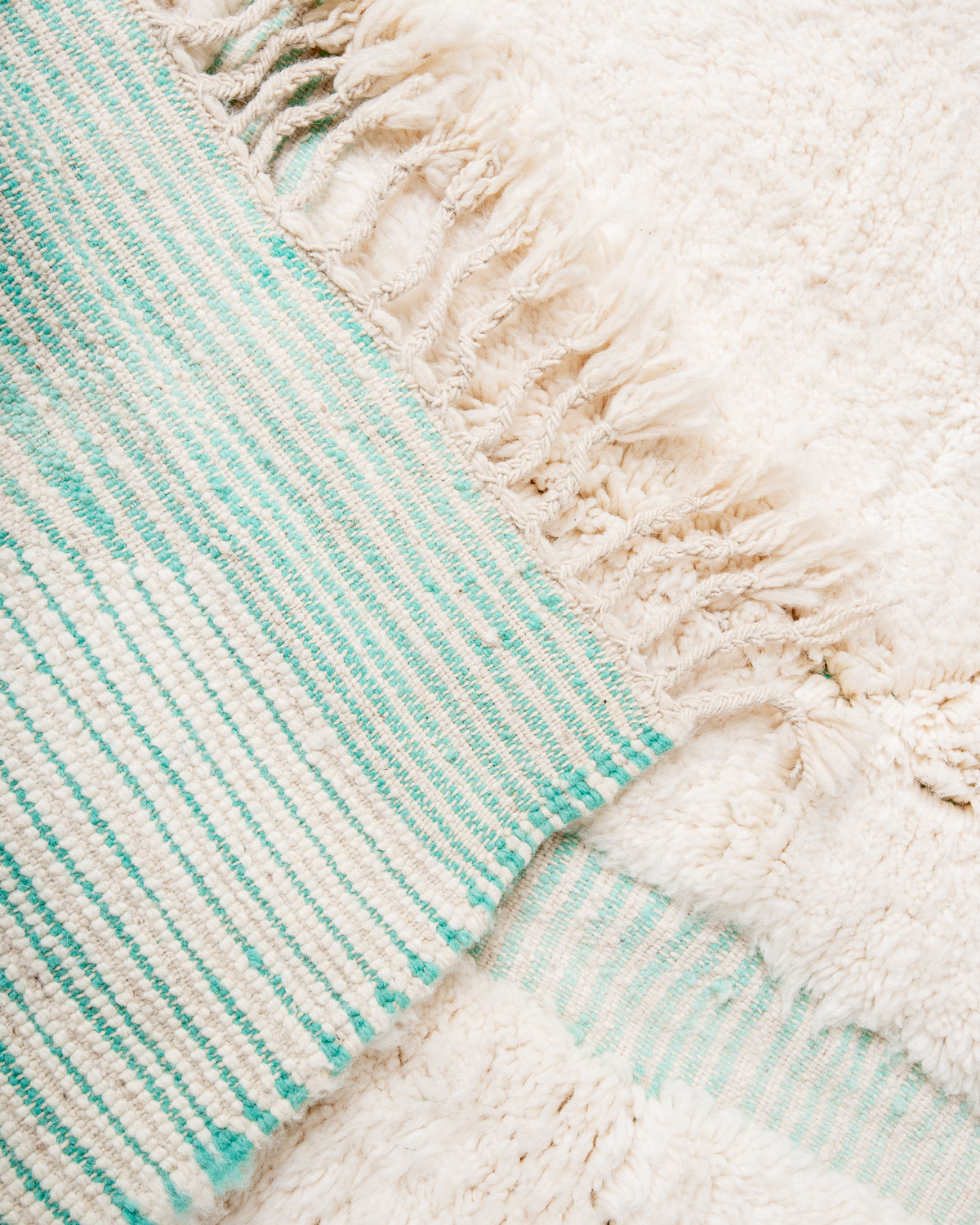 Modern, designer, handcrafted Berber rug from Morocco. Beniourain carpet with beautiful colours and patterns and fluffy wool texture.