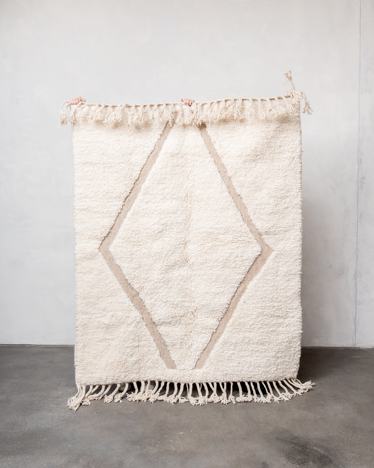 Modern, designer, handcrafted Berber rug from Morocco. Beniourain carpet with beautiful colours and patterns and fluffy wool texture.