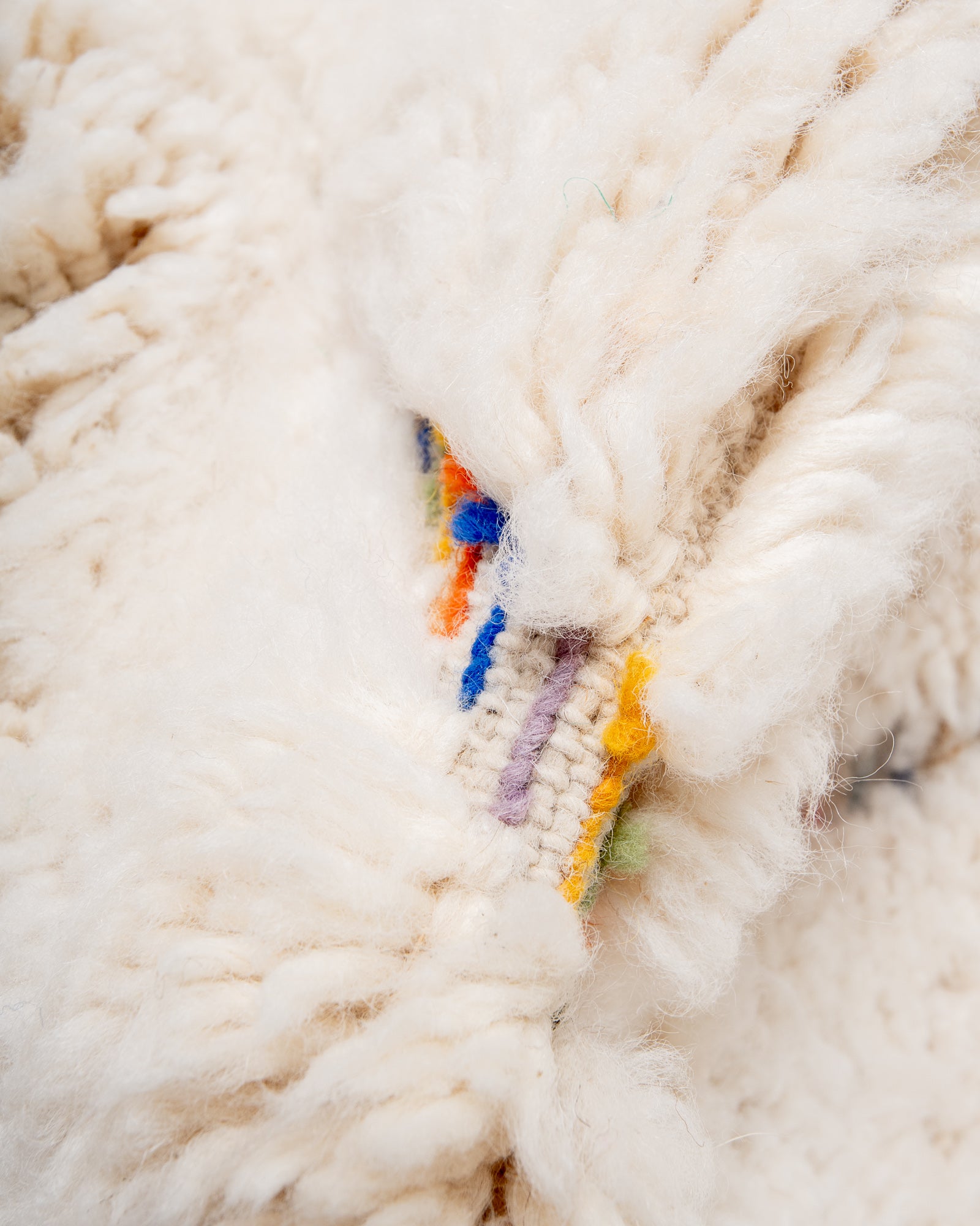 Modern, designer, handcrafted Berber rug from Morocco. Beniourain carpet with beautiful colours and patterns and fluffy wool texture.