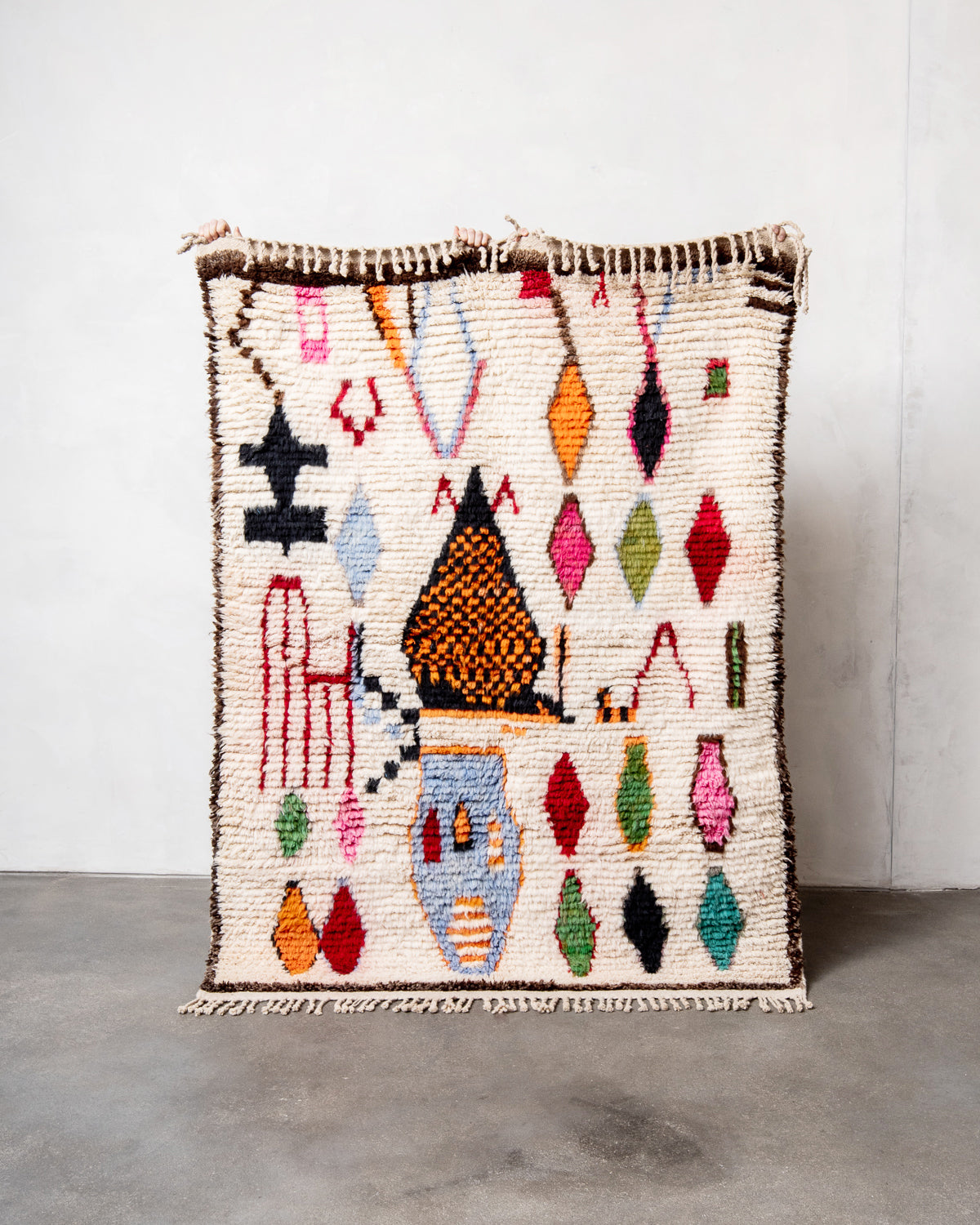 Modern, designer, handcrafted Berber rug from Morocco. Beniourain carpet with beautiful colours and patterns and fluffy wool texture.