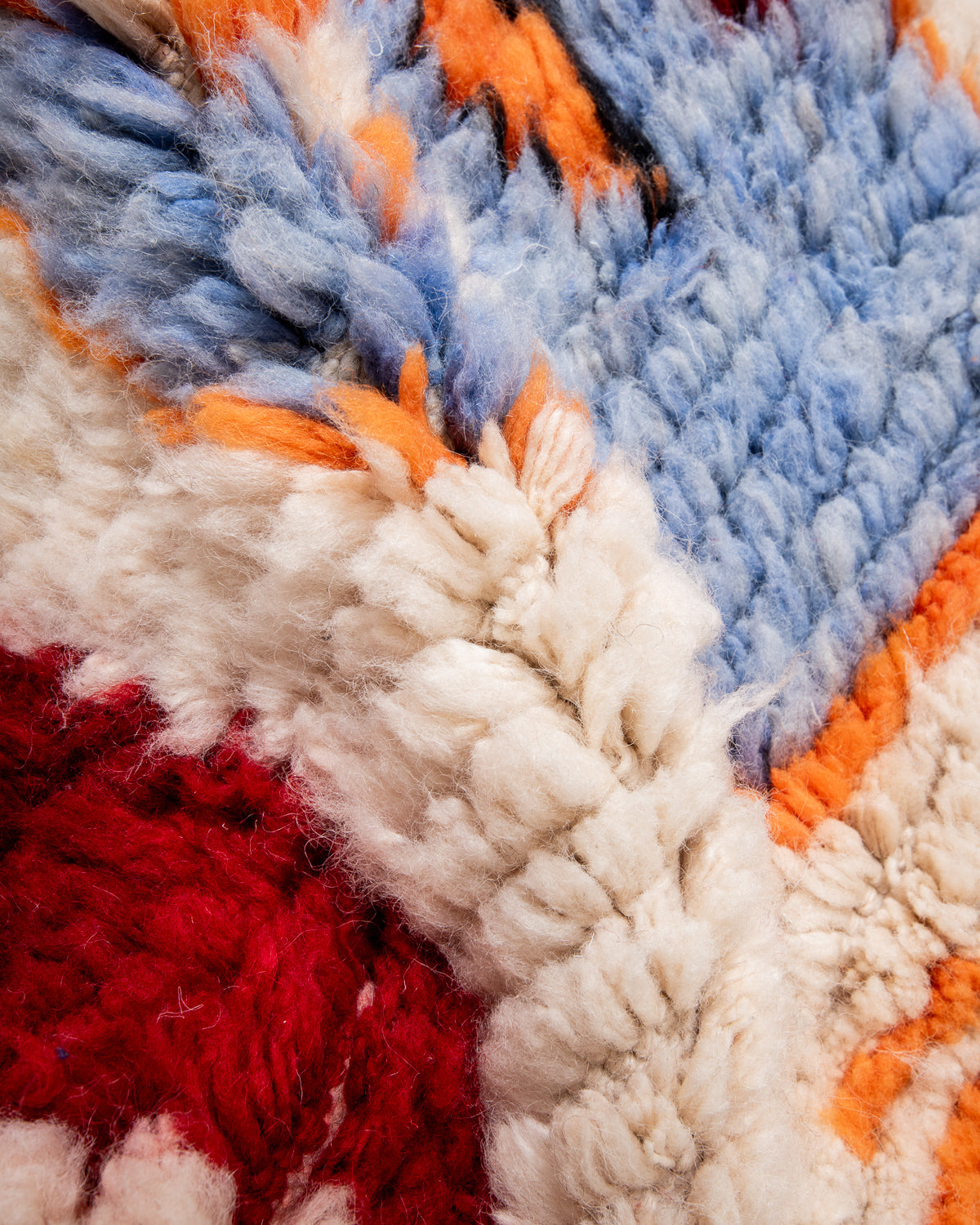 Modern, designer, handcrafted Berber rug from Morocco. Beniourain carpet with beautiful colours and patterns and fluffy wool texture.