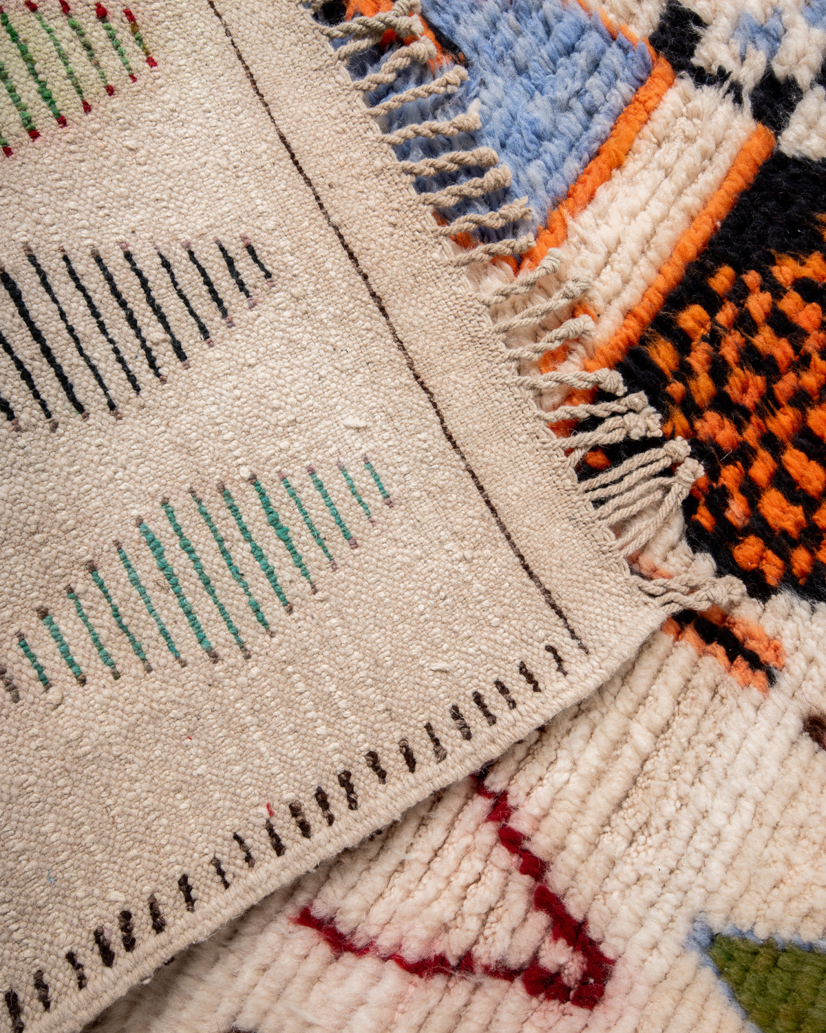 Modern, designer, handcrafted Berber rug from Morocco. Beniourain carpet with beautiful colours and patterns and fluffy wool texture.