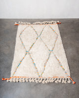 Modern, designer, handcrafted Berber rug from Morocco. Beniourain carpet with beautiful colours and patterns and fluffy wool texture. 