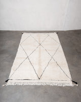 Modern, designer, handcrafted Berber rug from Morocco. Beniourain carpet with minimalist design, natural wool pile and a fluffy texture.