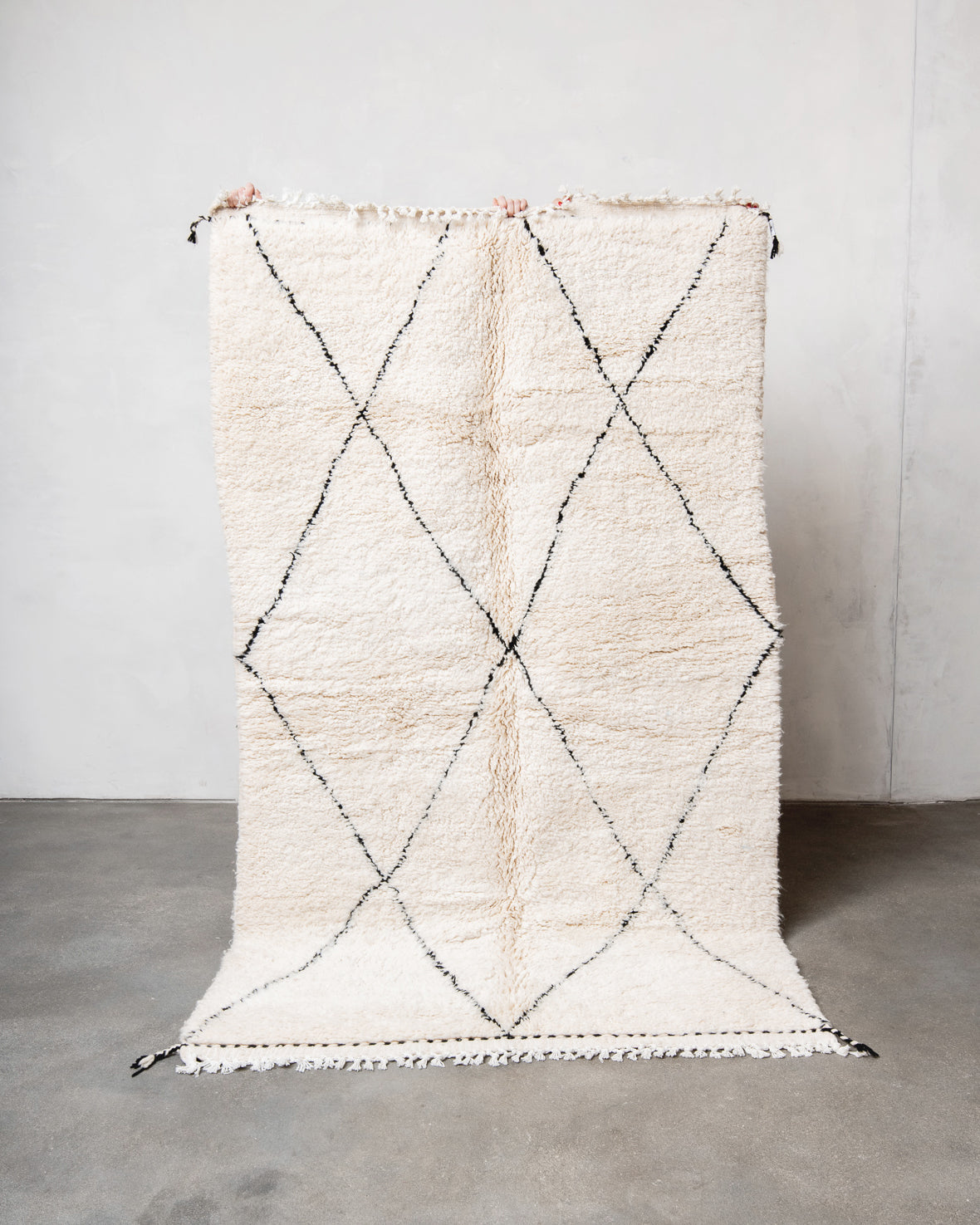 Modern, designer, handcrafted Berber rug from Morocco. Beniourain carpet with minimalist design, natural wool pile and a fluffy texture.