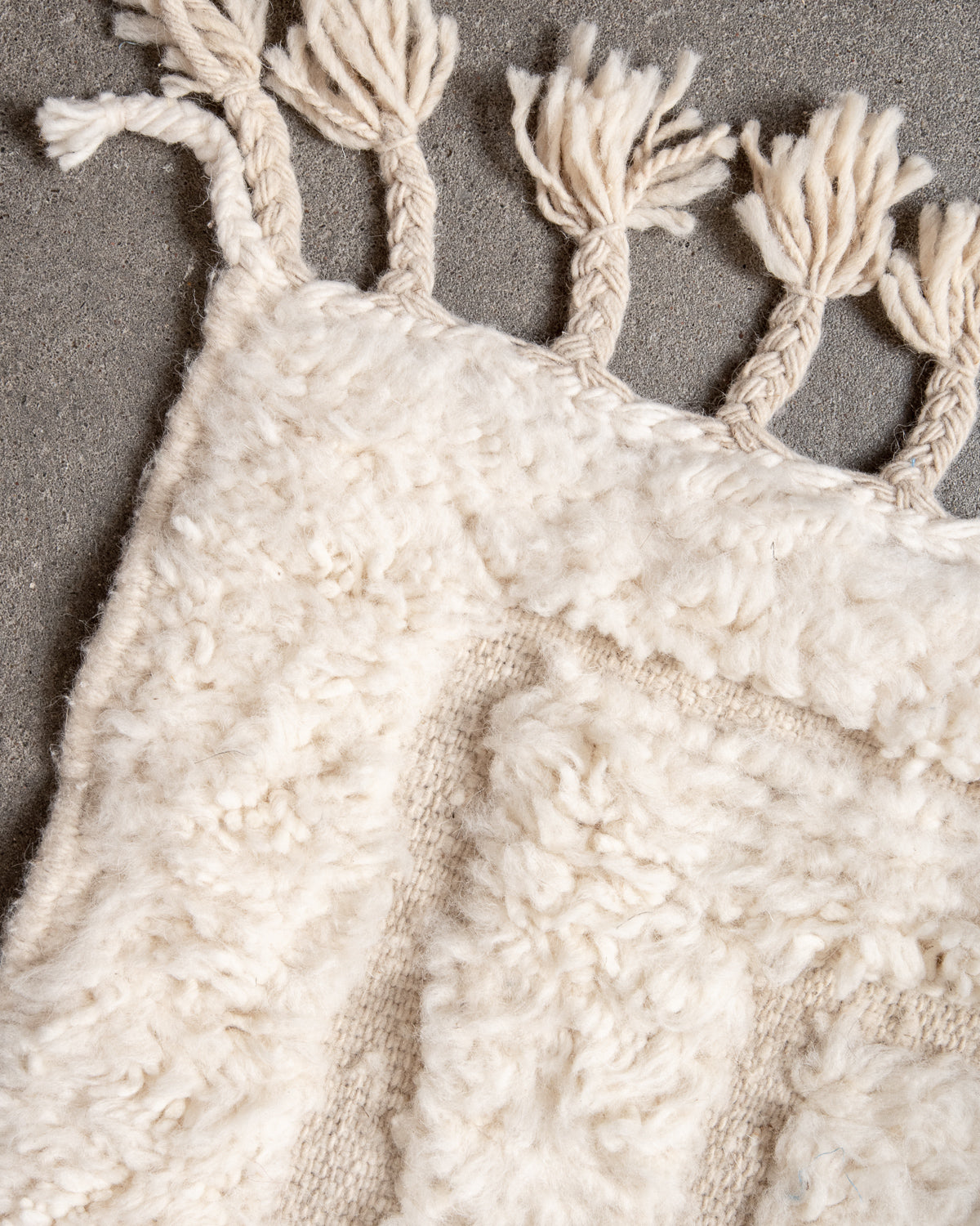 Modern, designer, handcrafted Berber rug from Morocco. Beniourain carpet with minimalist design, natural wool pile and a fluffy texture.