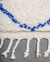 Modern, designer, handcrafted Berber rug from Morocco. Beniourain carpet with beautiful colours and patterns and fluffy wool texture.