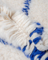 Modern, designer, handcrafted Berber rug from Morocco. Beniourain carpet with beautiful colours and patterns and fluffy wool texture.