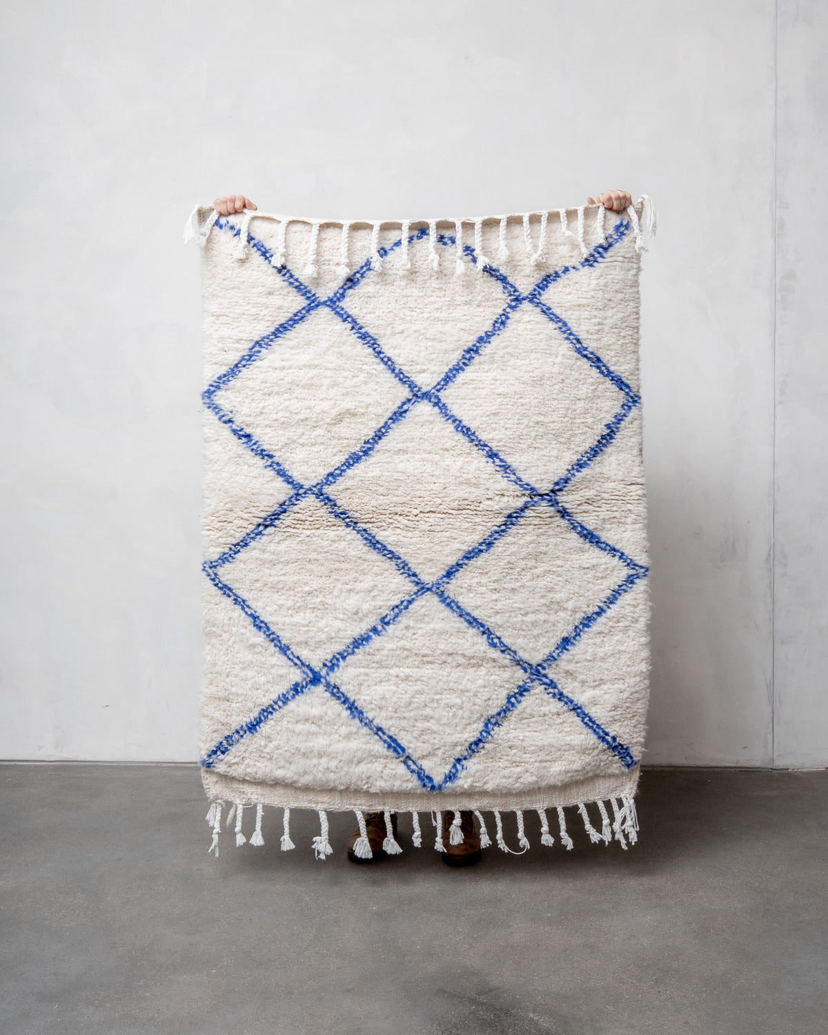 Modern, designer, handcrafted Berber rug from Morocco. Beniourain carpet with beautiful colours and patterns and fluffy wool texture.
