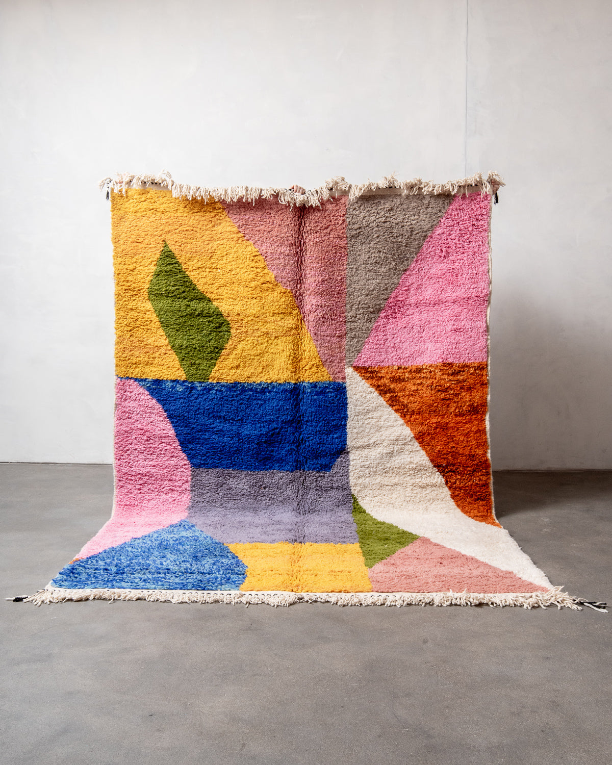 Modern, designer, handcrafted Berber rug from Morocco. Beniourain carpet with beautiful colours and patterns and fluffy wool texture.