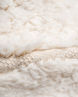 Modern, designer, handcrafted Berber rug from Morocco. Beniourain carpet with minimalist design, natural wool pile and a fluffy texture.