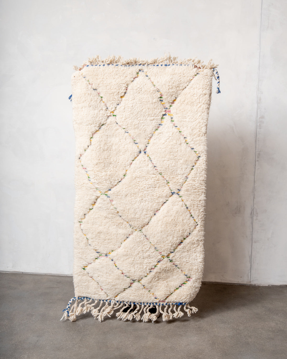 Modern, designer, handcrafted Berber rug from Morocco. Beniourain carpet with beautiful colours and patterns and fluffy wool texture.