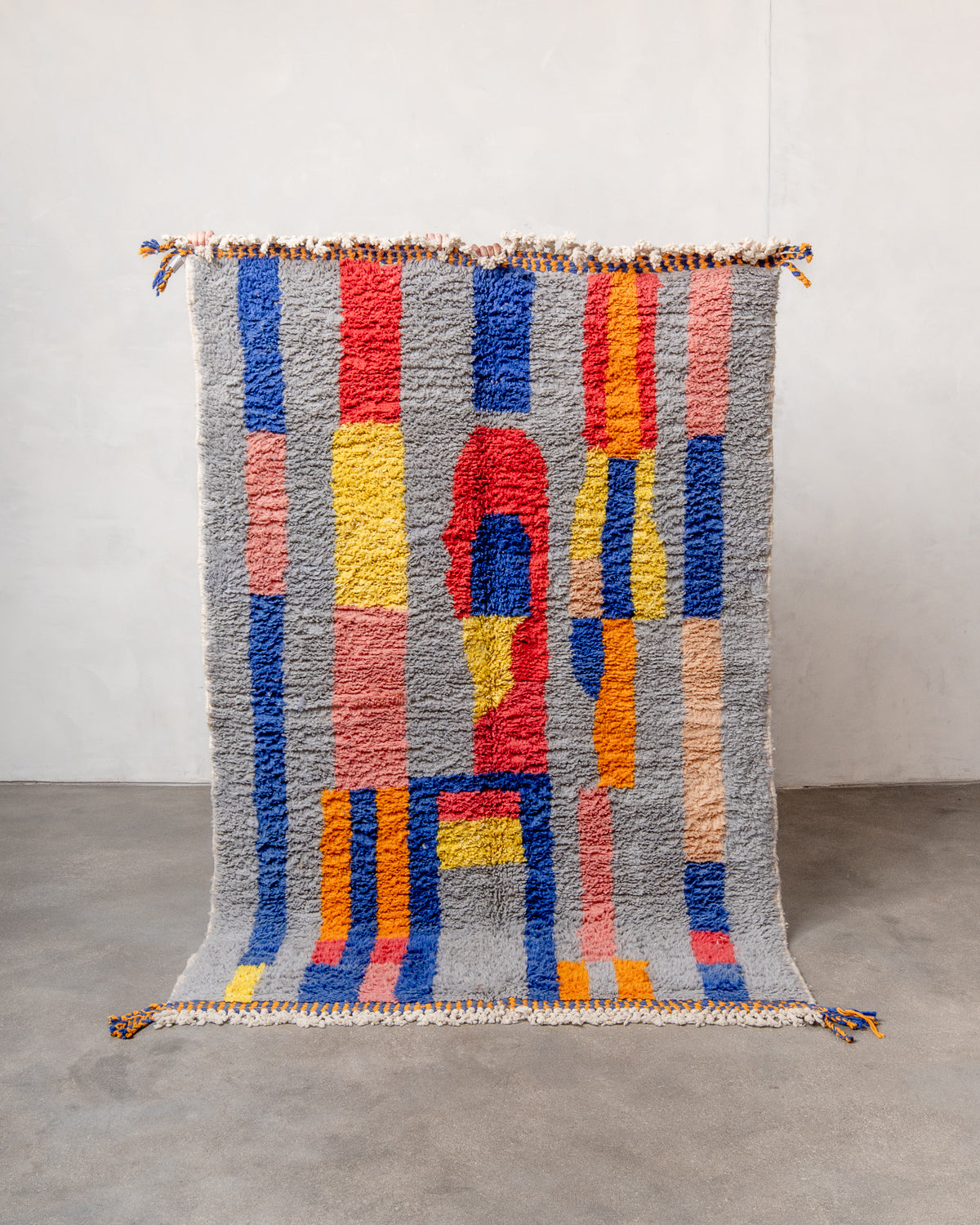 Modern, designer, handcrafted Berber rug from Morocco. Beniourain carpet with beautiful colours and patterns and fluffy wool texture.