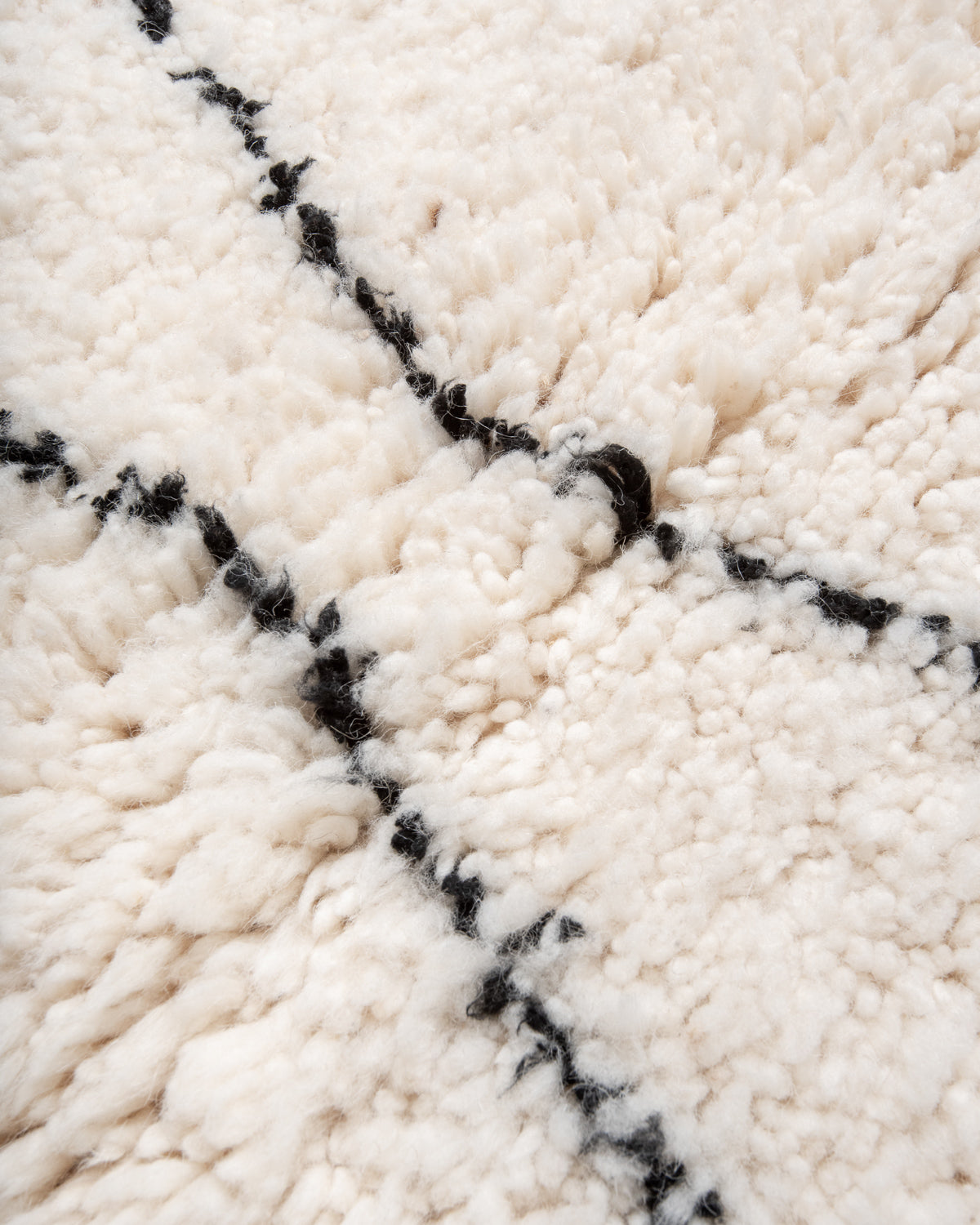 Modern, designer, handcrafted Berber rug from Morocco. Beniourain carpet with beautiful colours and patterns and fluffy wool texture. 