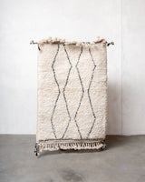 Modern, designer, handcrafted Berber rug from Morocco. Beniourain carpet with beautiful colours and patterns and fluffy wool texture. 