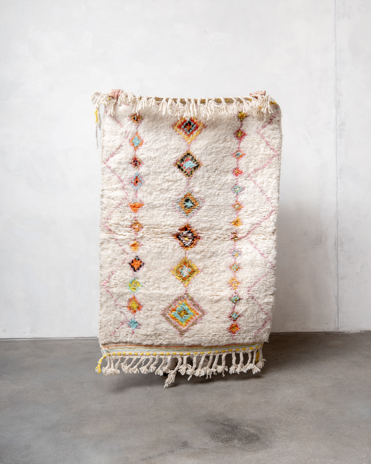 Modern, designer, handcrafted Berber rug from Morocco. Beniourain carpet with beautiful colours and patterns and fluffy wool texture.