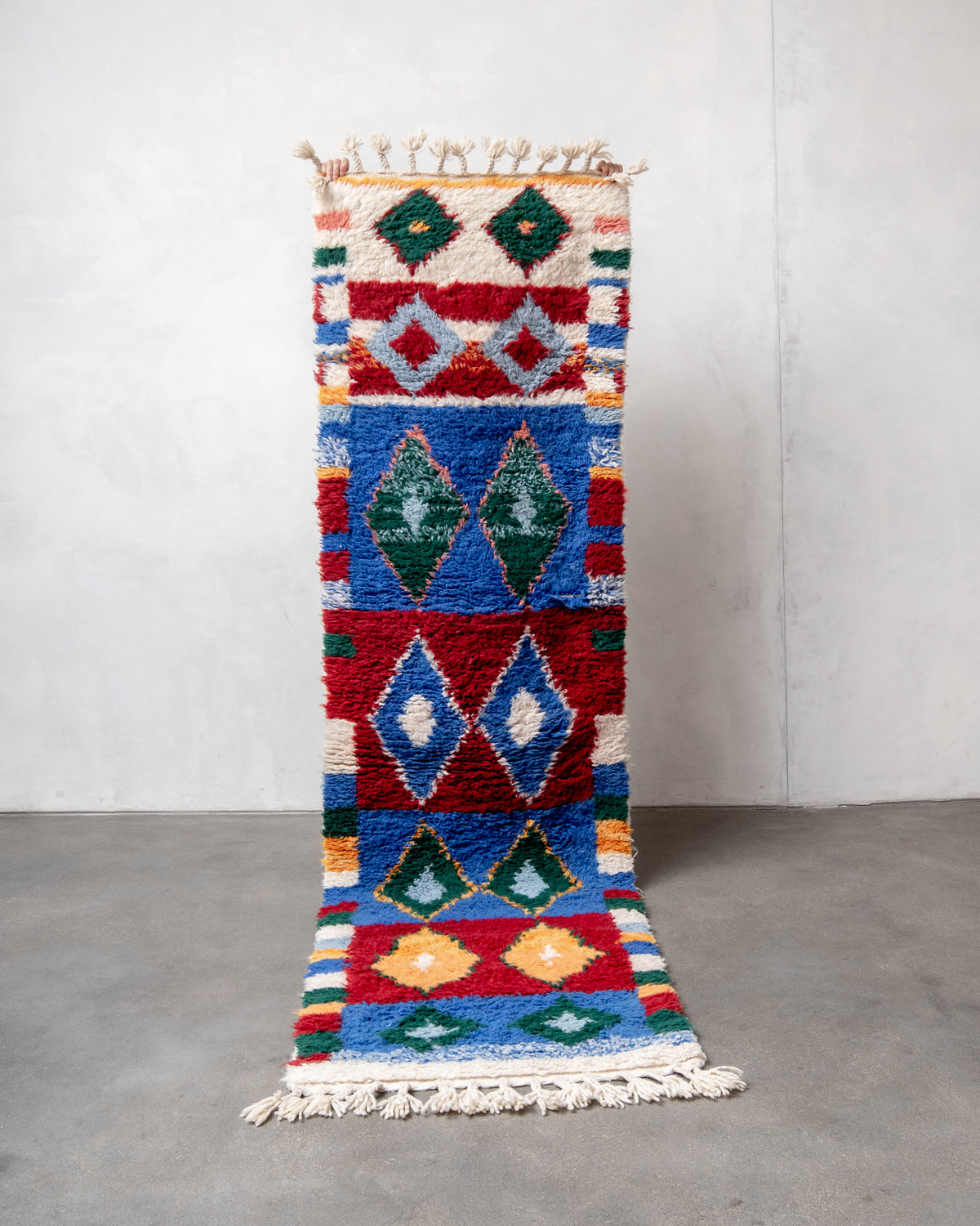 Modern, designer, handcrafted Berber runner rug from Morocco. Beniourain carpet with beautiful colours and patterns and fluffy wool texture.