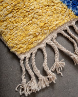 Modern, designer, handcrafted Berber rug from Morocco. Beniourain carpet with beautiful colours and patterns and fluffy wool texture.