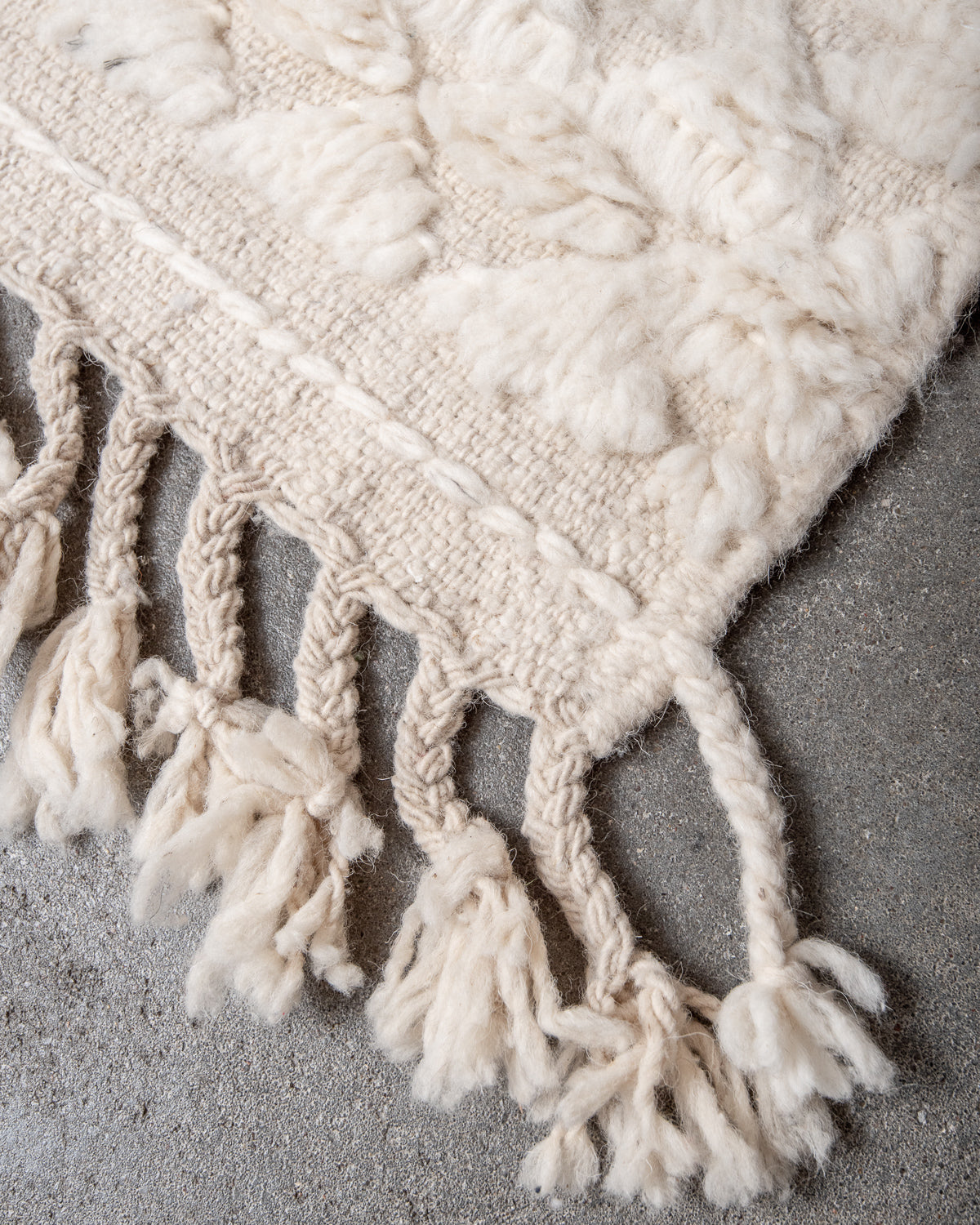 Modern, designer, handcrafted Berber rug from Morocco. Beniourain carpet with minimalist design, natural wool pile and a fluffy texture.