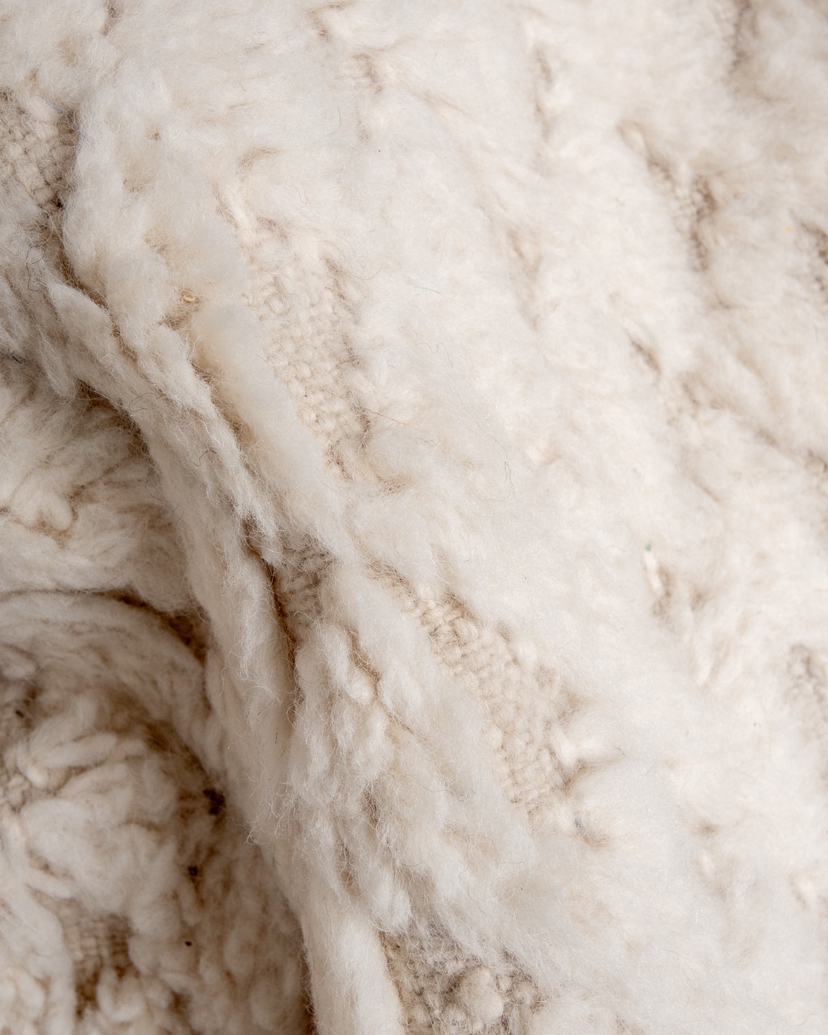 Modern, designer, handcrafted Berber rug from Morocco. Beniourain carpet with minimalist design, natural wool pile and a fluffy texture.