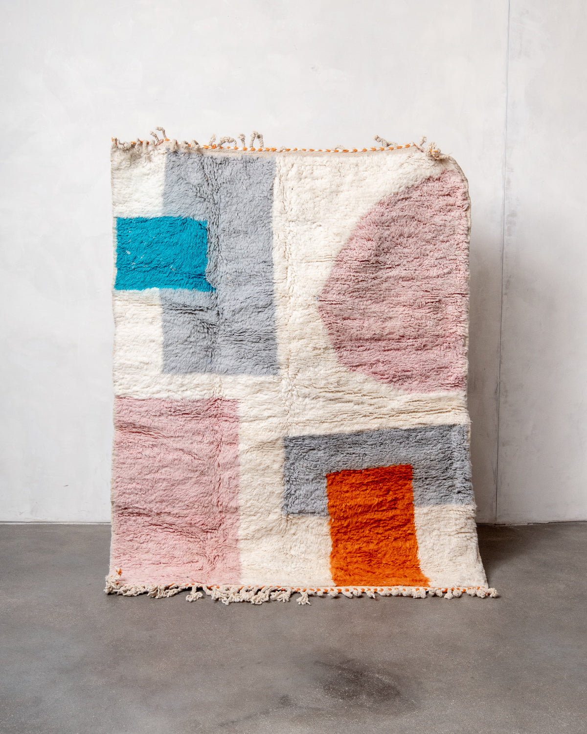 Modern, designer, handcrafted Berber rug from Morocco. Beniourain carpet with beautiful colours and patterns and fluffy wool texture.