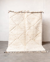Modern, designer, handcrafted Berber rug from Morocco. Beniourain carpet with minimalist design, natural wool pile and a fluffy texture.