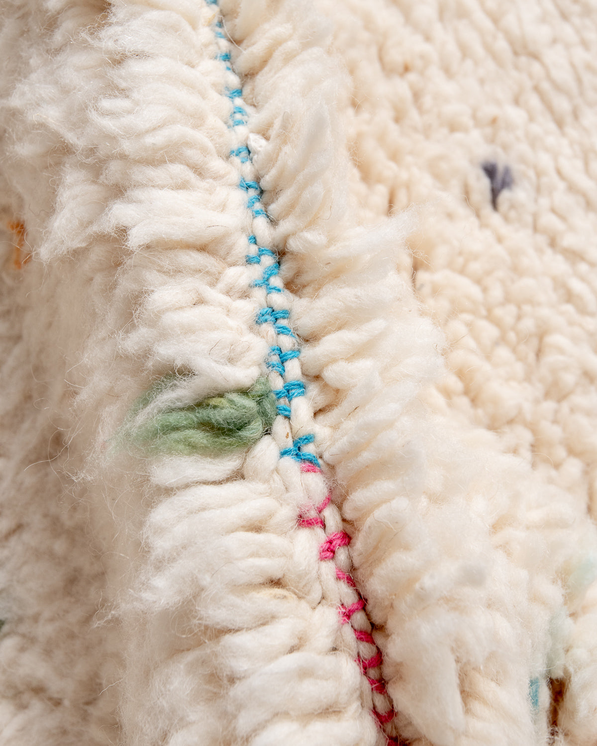 Modern, designer, handcrafted Berber rug from Morocco. Beniourain carpet with beautiful colours and patterns and fluffy wool texture.