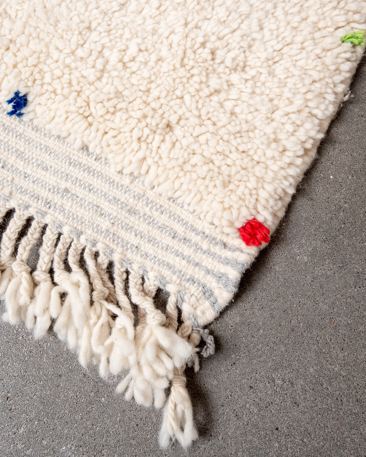 Modern, designer, handcrafted Berber rug from Morocco. Beniourain carpet with beautiful colours and patterns and fluffy wool texture.
