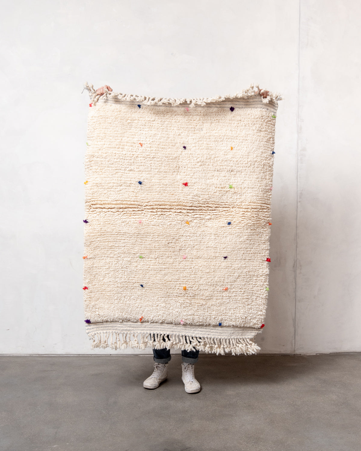 Modern, designer, handcrafted Berber rug from Morocco. Beniourain carpet with beautiful colours and patterns and fluffy wool texture.