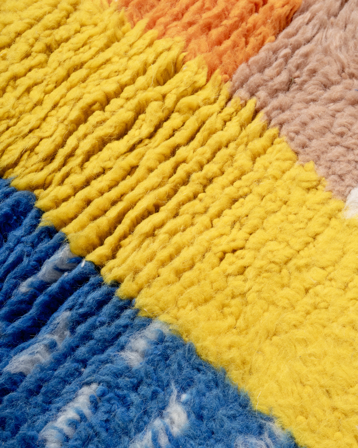 Modern, designer, handcrafted Berber rug from Morocco. Beniourain carpet with beautiful colours and patterns and fluffy wool texture.