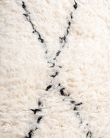 Modern, designer, handcrafted Berber rug from Morocco. Beniourain carpet with minimalist design, natural wool pile and a fluffy texture.