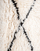 Modern, designer, handcrafted Berber rug from Morocco. Beniourain carpet with minimalist design, natural wool pile and a fluffy texture.