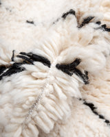 Modern, designer, handcrafted Berber rug from Morocco. Beniourain carpet with minimalist design, natural wool pile and a fluffy texture.