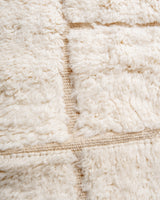 Modern, designer, handcrafted Berber rug from Morocco. Beniourain carpet with minimalist design, natural wool pile and a fluffy texture.